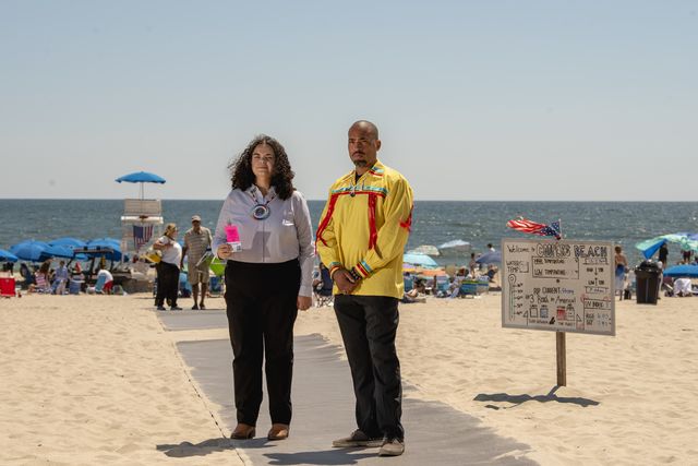 Tribal lawyer and campaign leader Tela Troge (L) and Tribal Chairman Bryan Polite (R) pose for a photo, Aug. 18, 2022. at Coopers Beach.
